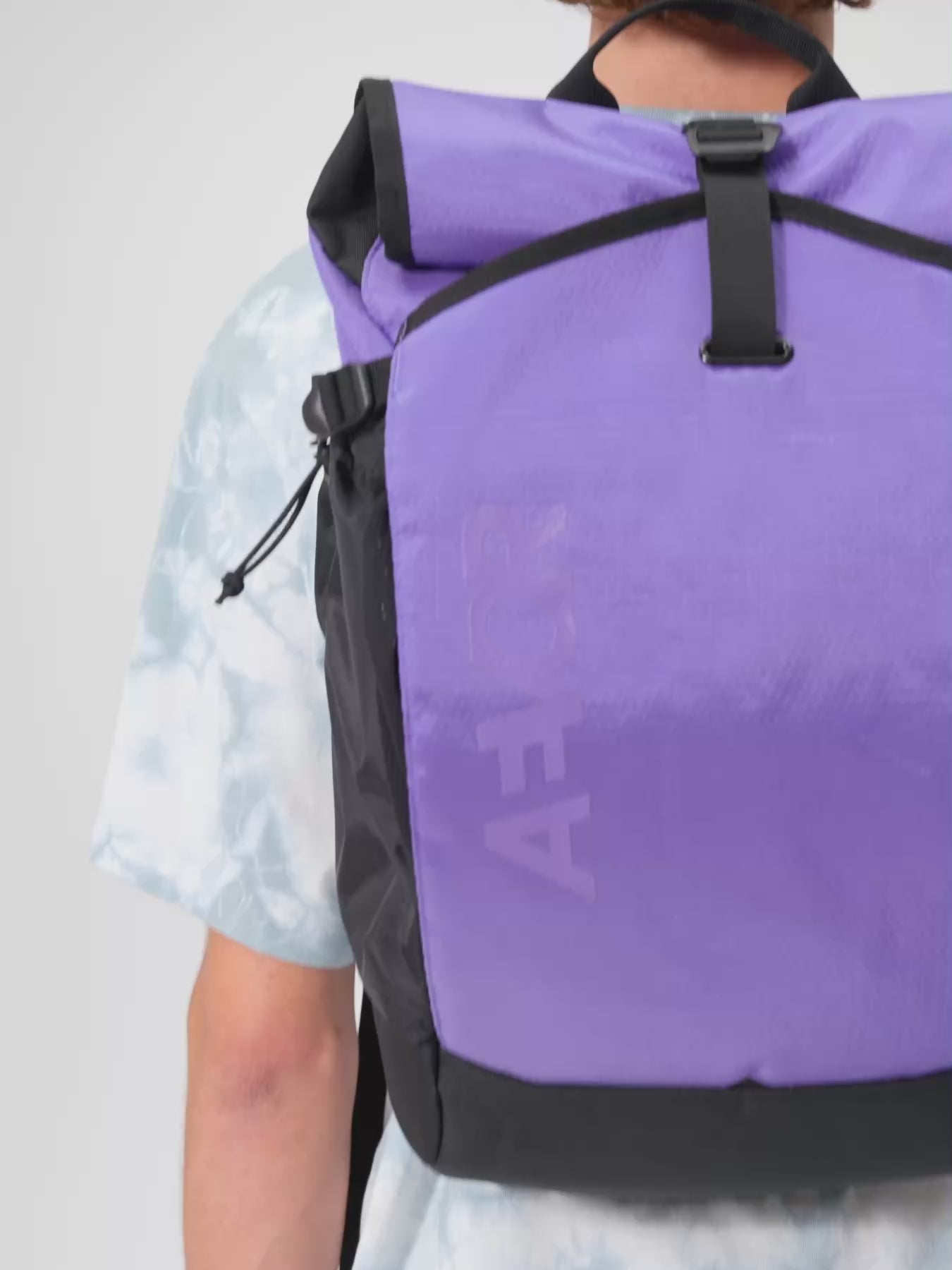 AEVOR-Roll-Pack-Proof-Purple-model-video