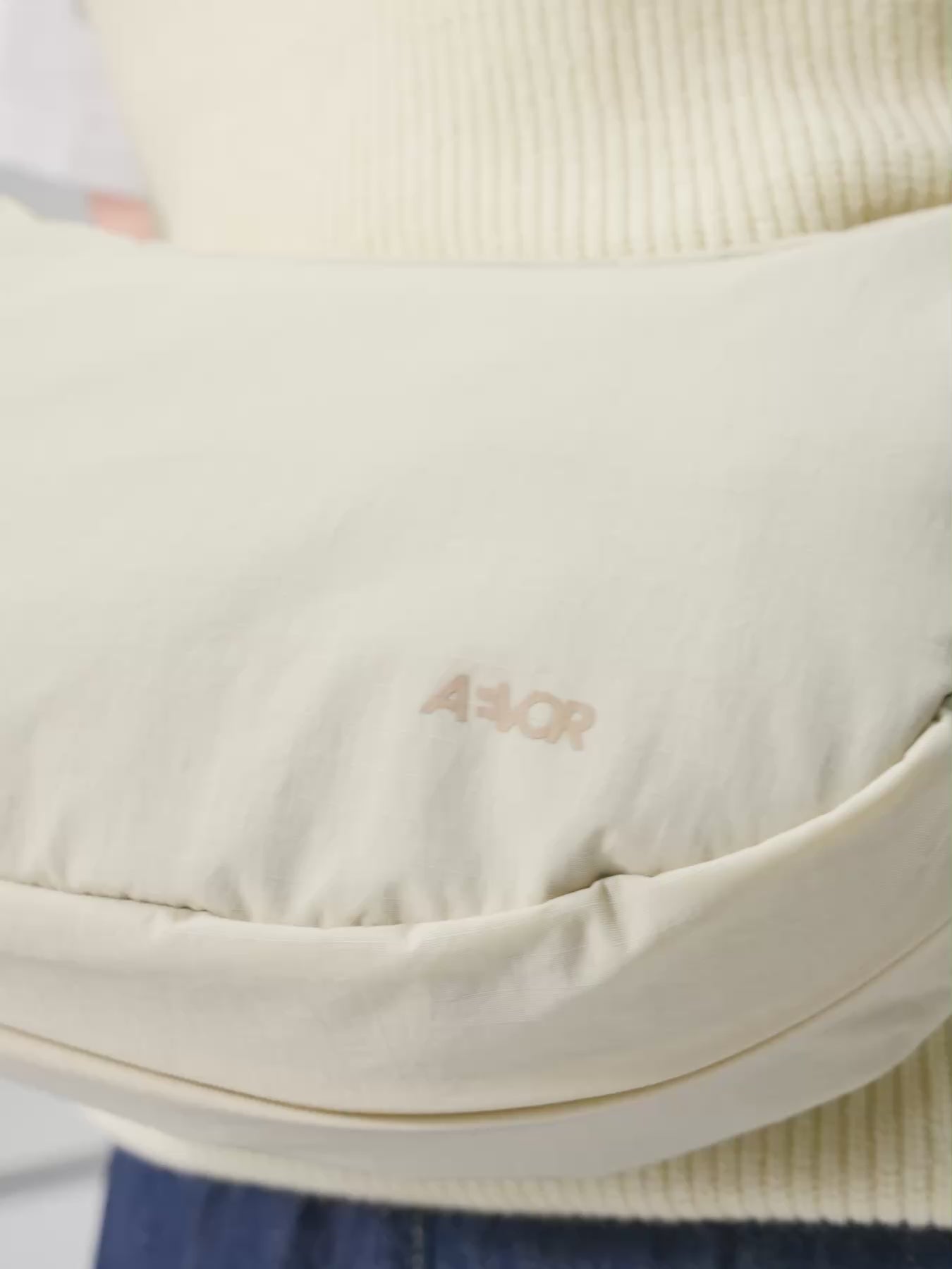 AEVOR-Bike-Sling-Bag-Off-White-model-video