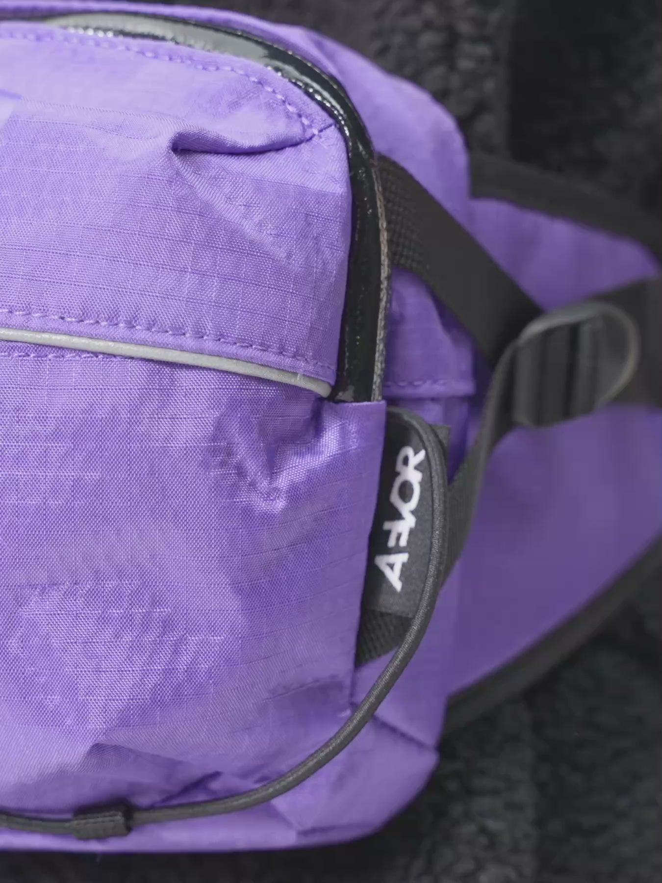 AEVOR-Bar-Bag-Proof-Purple-model-video