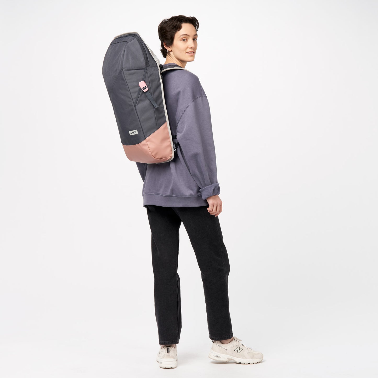 AEVOR-backpack-Daypack-Chilled-Rose-model-side