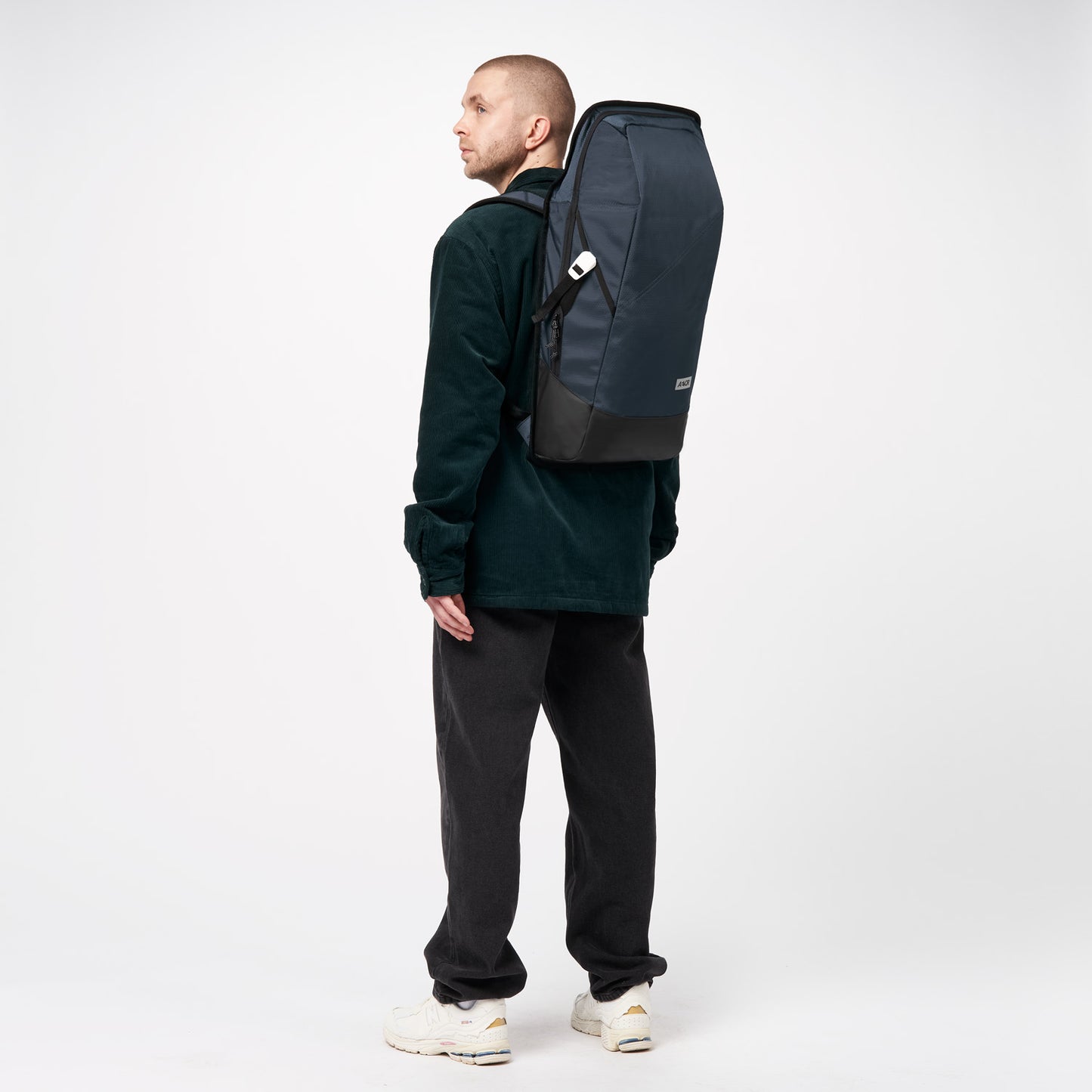 AEVOR-backpack-daypack-proof-petrol-model-side