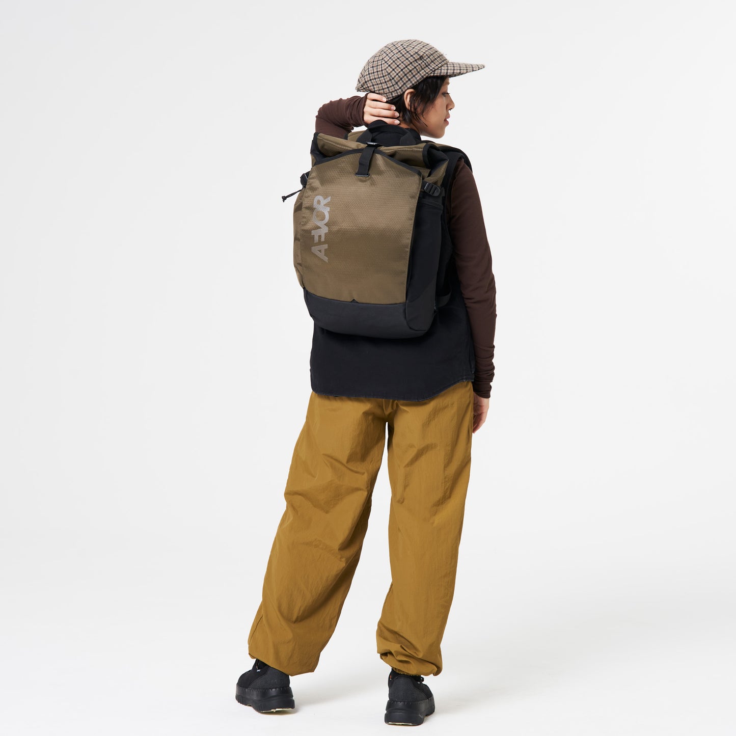 AEVOR-backpack-Rollpack-Proof-Olive-Gold-model-front