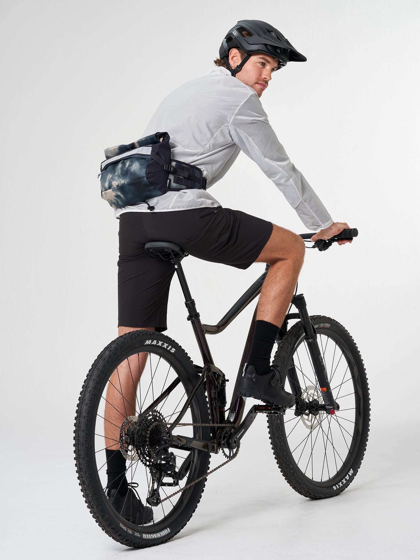 AEVOR-Waist-Pack-Proof-Tie-Dye-model-front