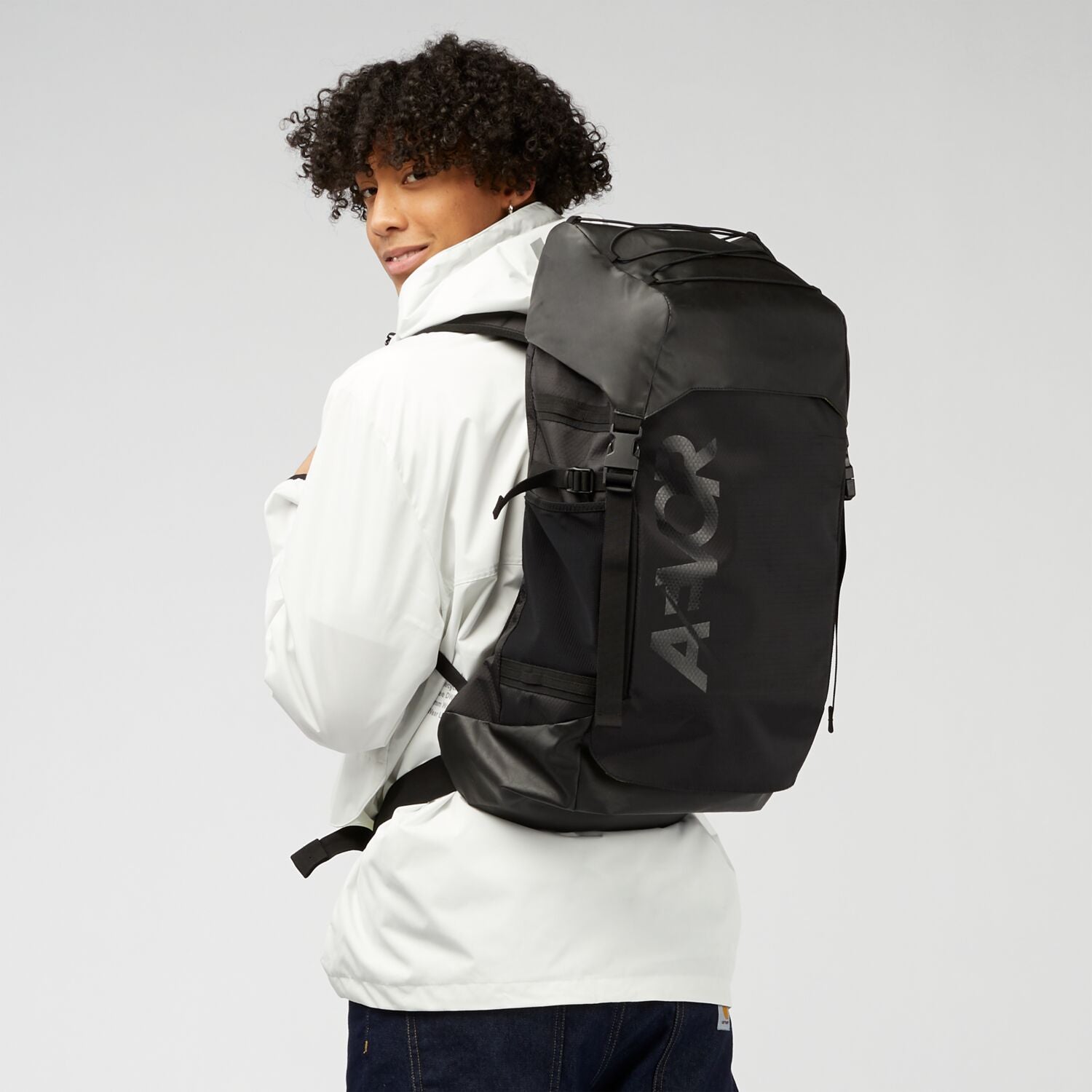 AEVOR-backpack-Explore-Pack-Proof-Black-model-side