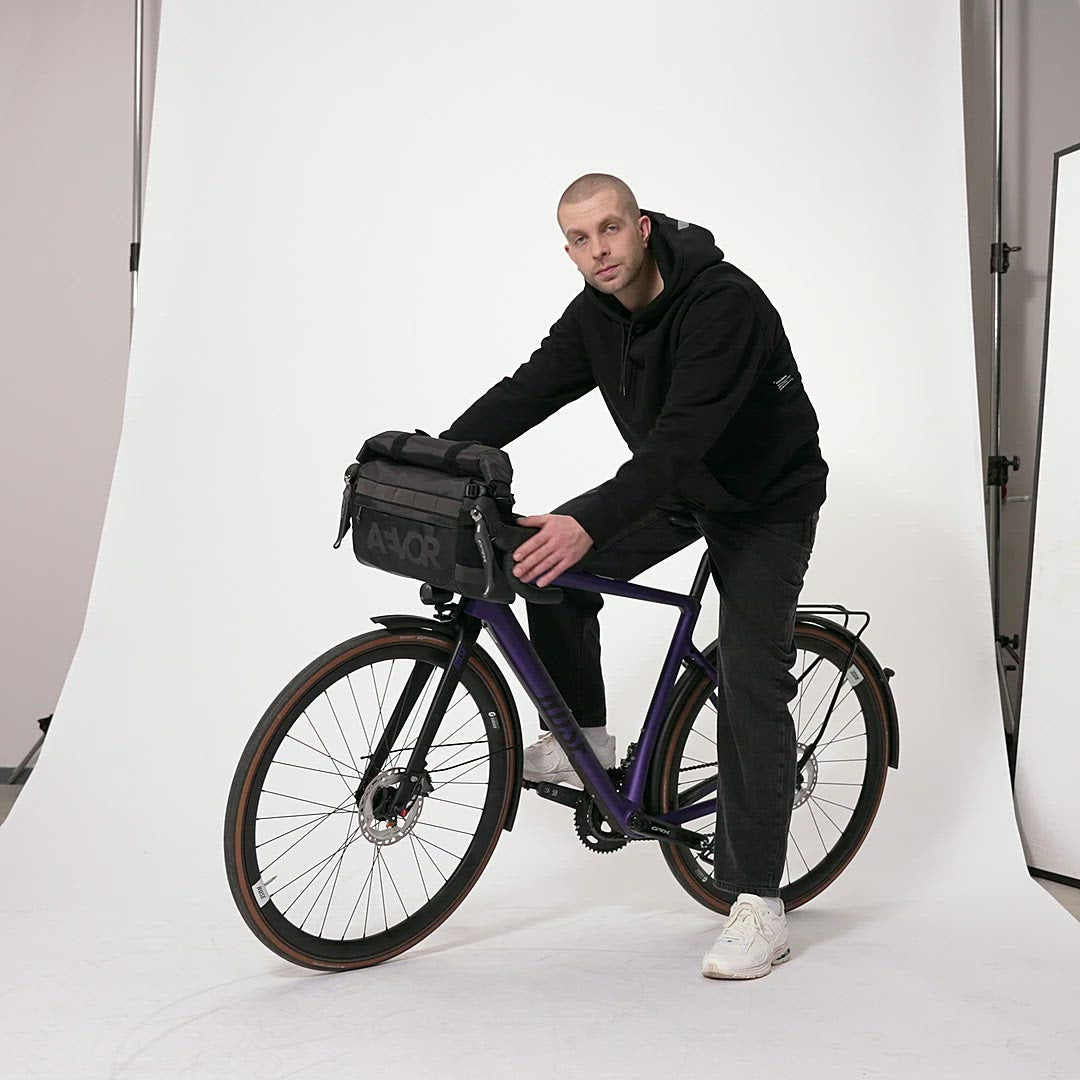 AEVOR-Triple-Bike-Bag-Proof-Black-model-video